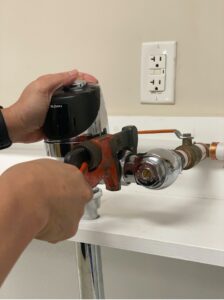 step two of installing a flush valve