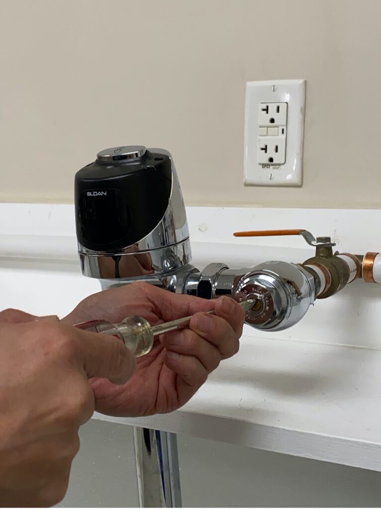 step 1, installing a flush valve
